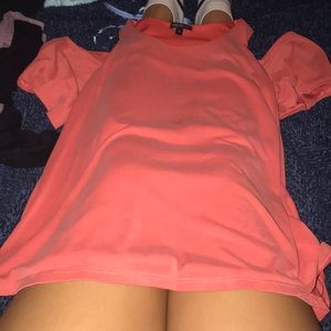 Pink tank off the shoulder shirt.